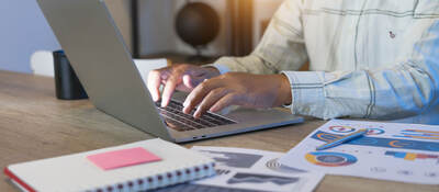 Person working on a laptop