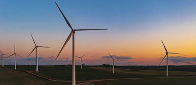 Drone view of a wind farm. Multiple wind turbines