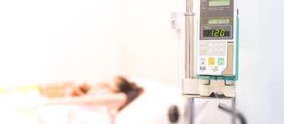 Infusion pump feeding IV drip into patients.