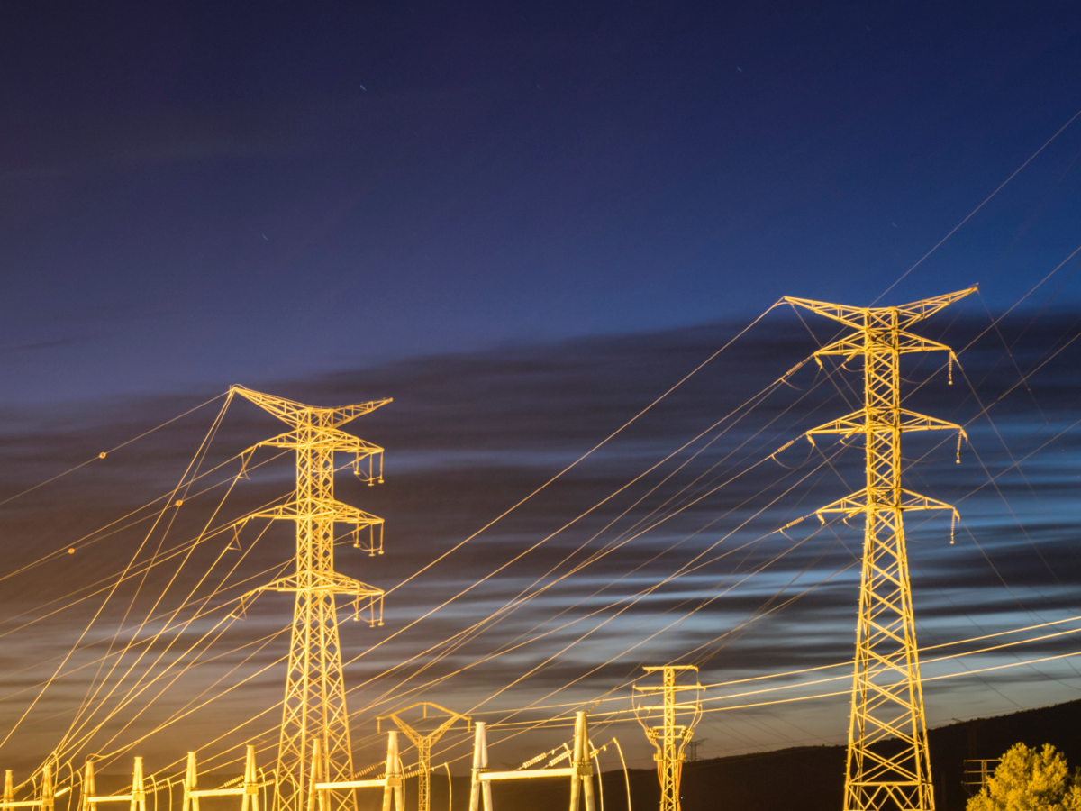 Electricity pylons at sunset